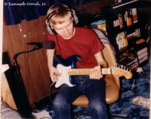 Ken Novak with guitar.jpg2